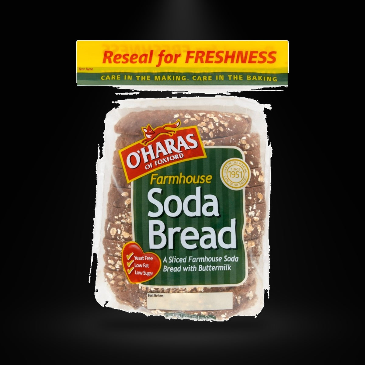 O'Haras soda bread on a black background with an overhead spotlight