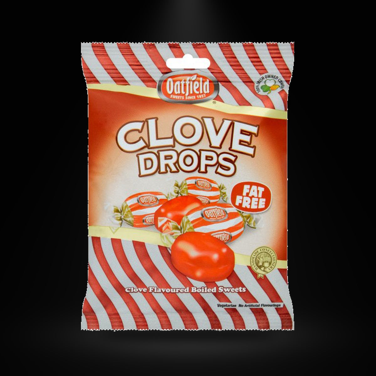 Oatfield Clove Drops on a black background with an overhead spotlight