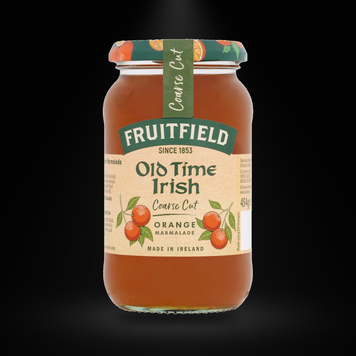 Old Time Irish Coarse Orange Marmalade on a black background with an overhead spotlight