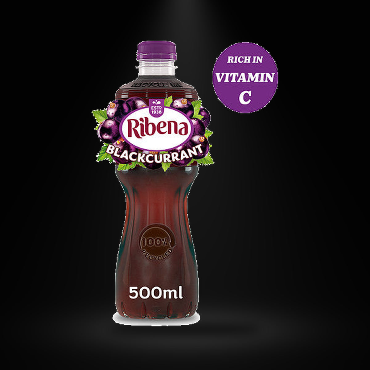 Ribena 500ml on a black background with an overhead spotlight