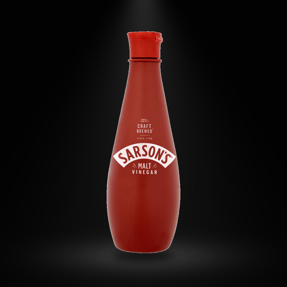 Sarson's Malt Vinegar 300ML on a black background with an overhead spotlight