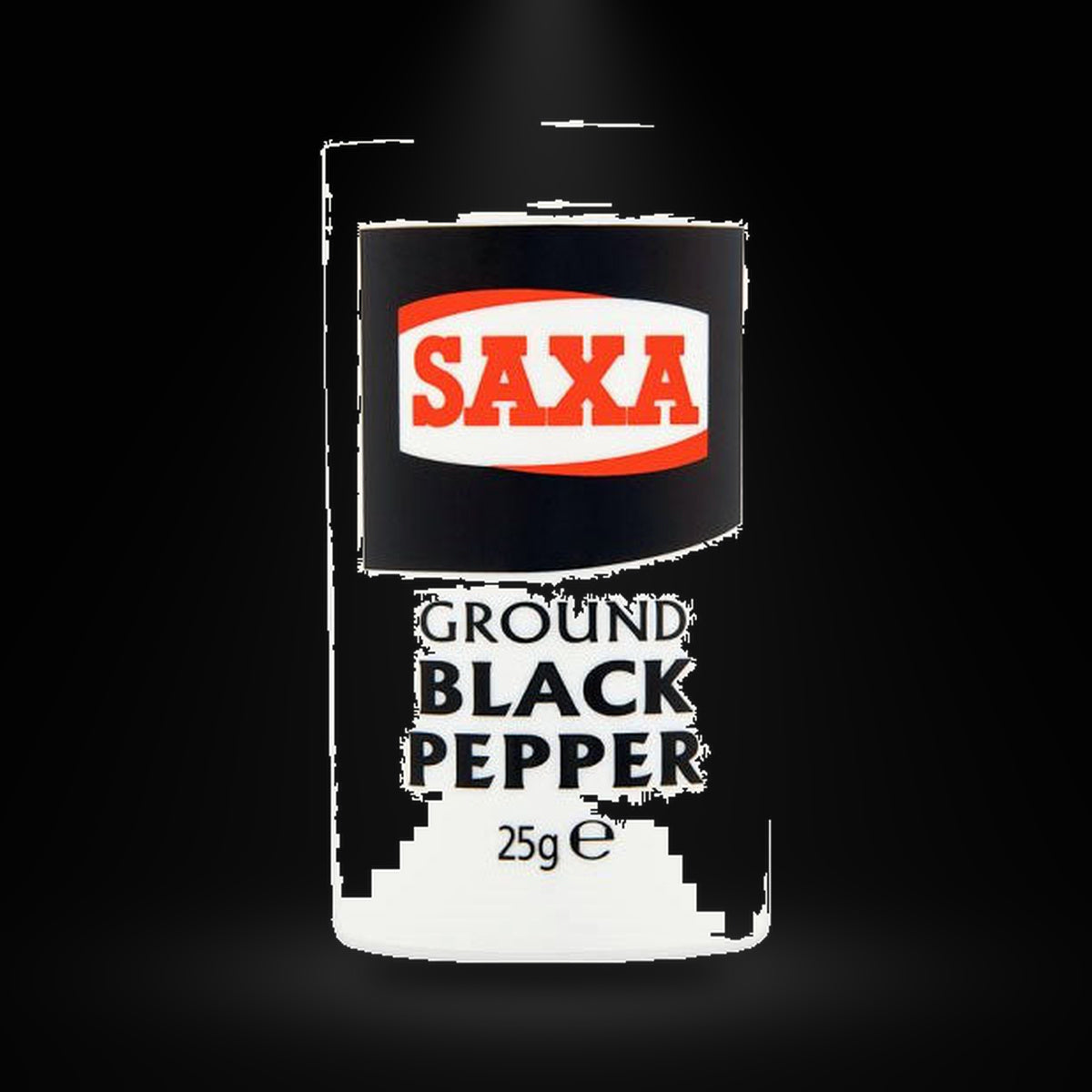 Saxa black pepper on a black background with an overhead spotlight