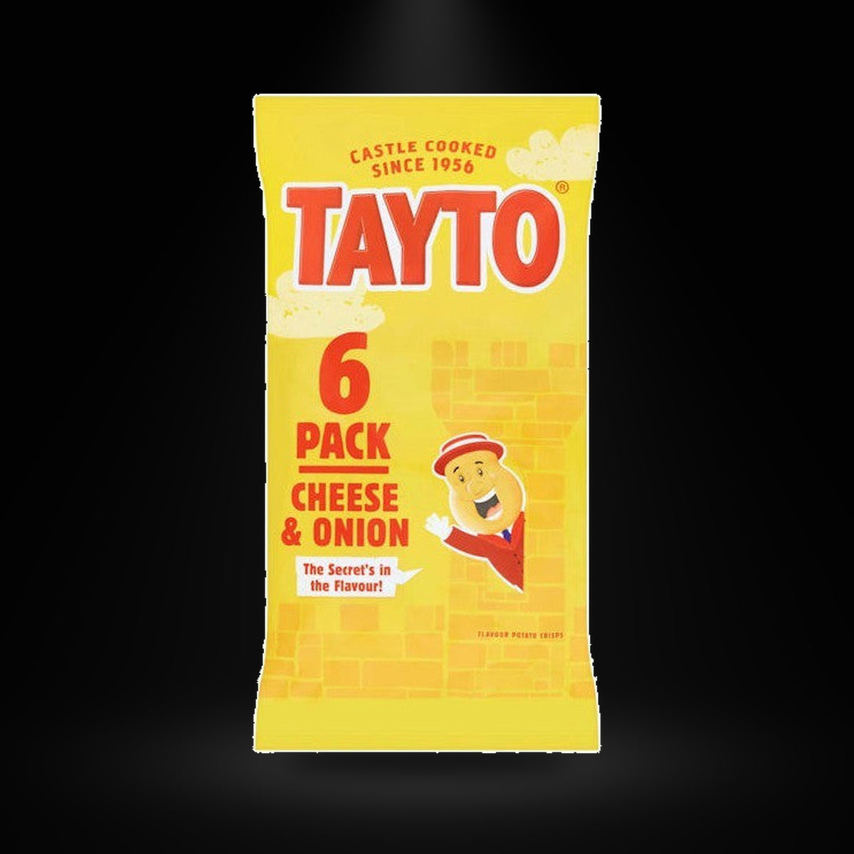 Tayto NI Cheese&Onion 6pk on a black background with an overhead spotlight