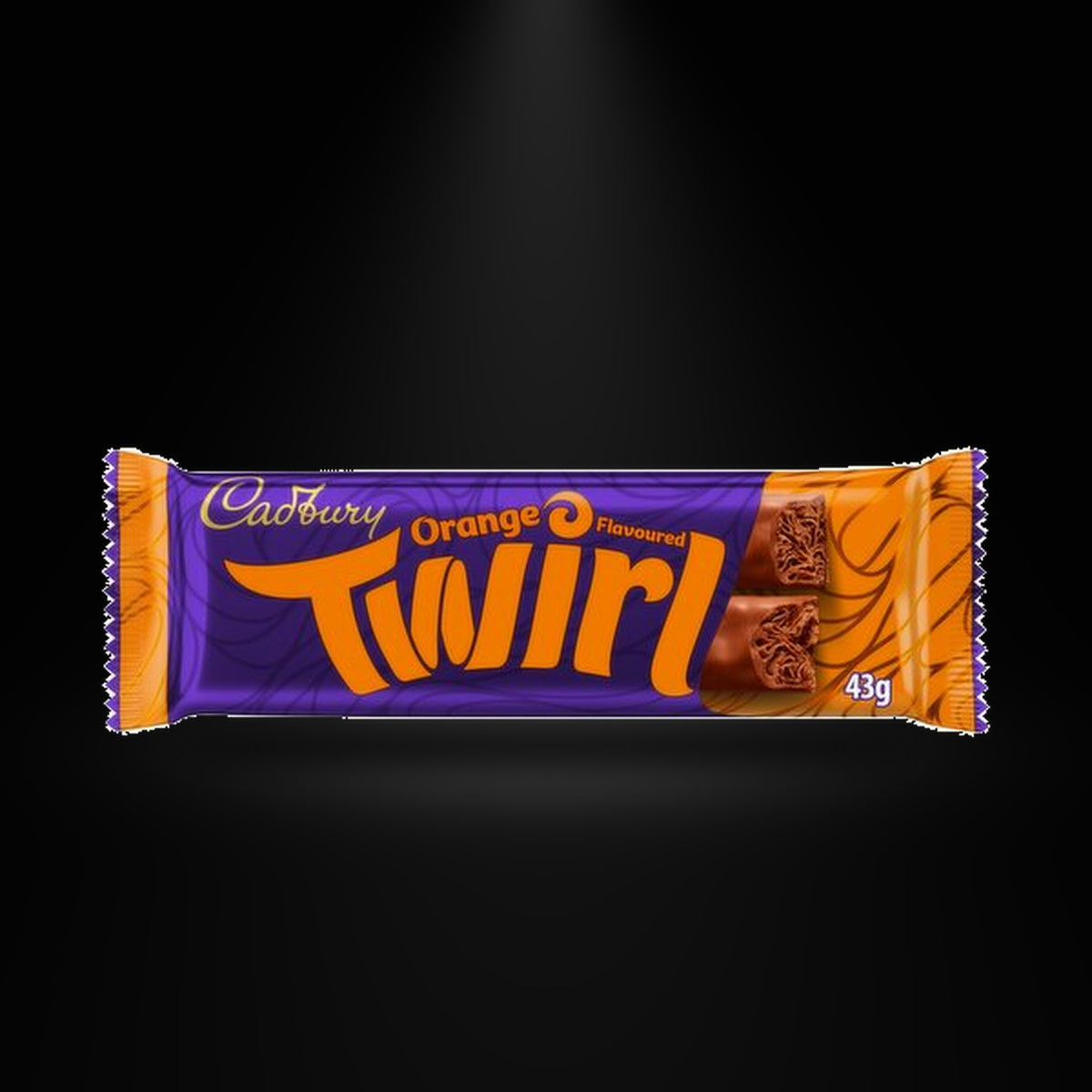 Twirl Orange 43g on a black background with an overhead spotlight