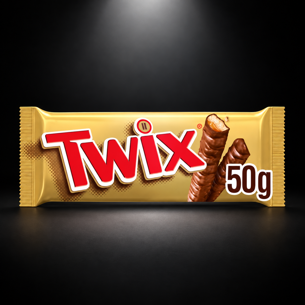 Twix 50g — black background with overhead spotlight
